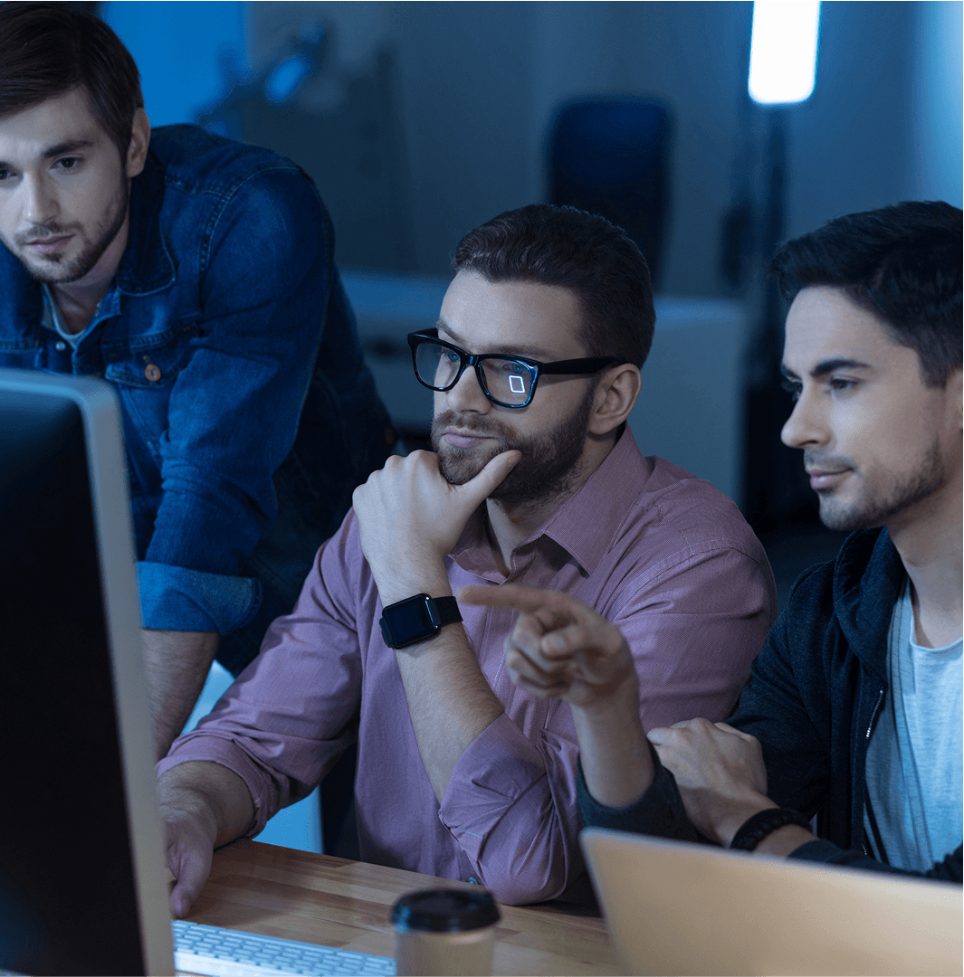 try-check-this-intelligent-handsome-brunette-man-sitting-with-his-colleagues-front-computer-pointing-it-while-working-together